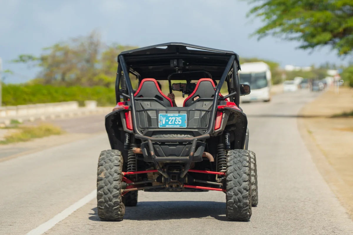 Aventurova UTV seen from behind on a paved road